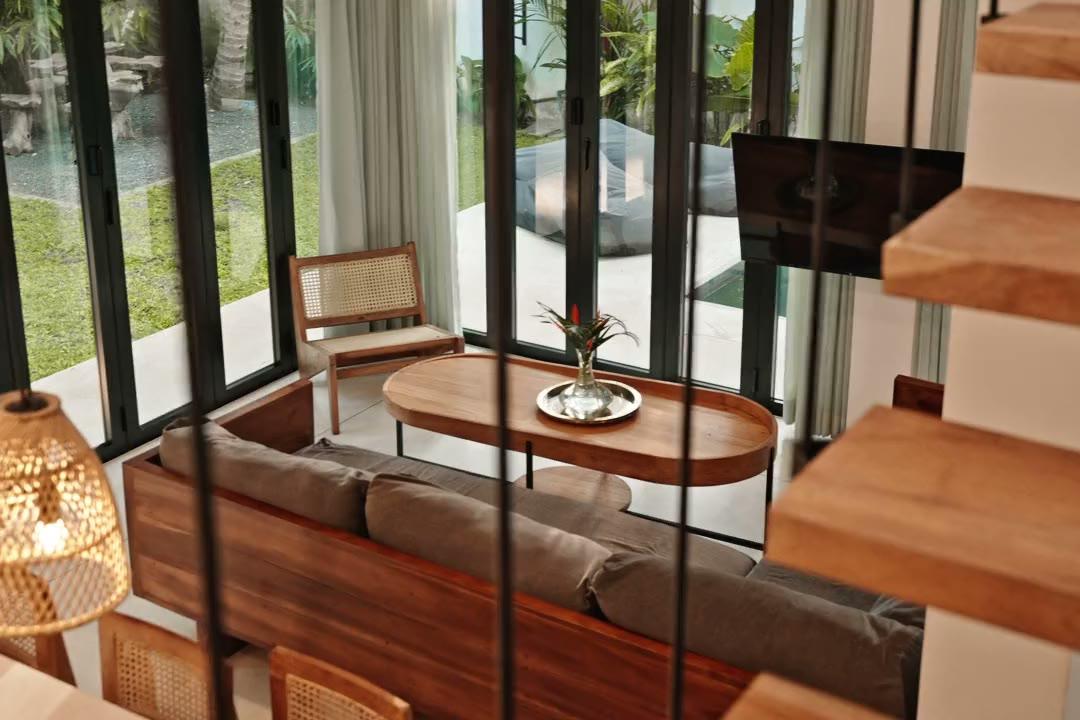 Inside a Terra villa: the swing table, living room, kitchen and private pool