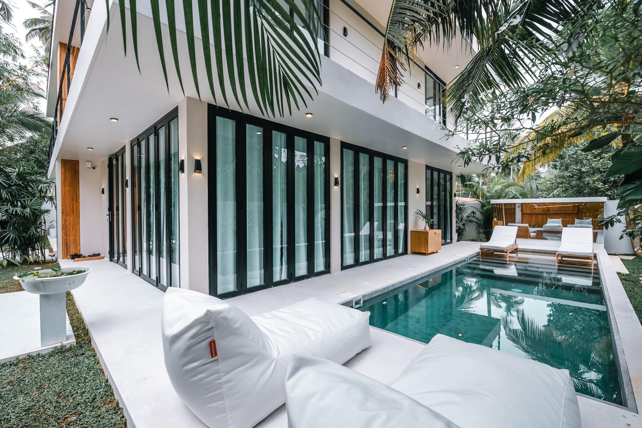 Two-storey Terra villa with private pool and palm shadows